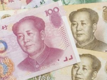 Đồng Nhân dân tệ chịu áp lực sau đợt hạ lãi suất của PBoC