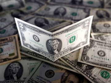 Đồng Đô la tăng giá, nhà đầu tư chờ đợi thêm thông tin từ Ukraine