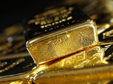 Vàng và đồng Đô la đều giảm khi Nga và Ukraine nối lại đàm phán