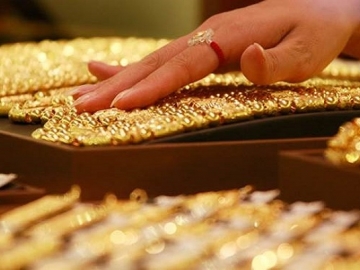 Vàng thế giới giảm xuống gần mức thấp nhất trong 1 tháng